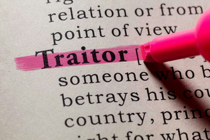 The word Traitor highlighted in pink marker.