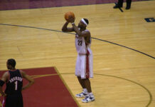 Basketball player 23 preparing to shoot free throw.