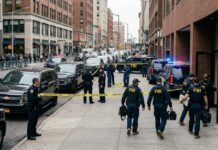 MASS CASUALTY Plot: DOJ Stops Neo-Nazi Attack… FBI agents conducting an operation at a city street crime scene