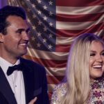 Kubrick’s Daughter DEMANDS Trump Kill Conservative Giant.. A smiling couple in formal attire standing in front of an American flag backdrop