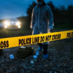 Pulitzer LEGEND Killed — It HAPPENED SO FAST! Police crime scene tape with investigator at dusk