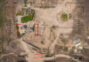 Aerial view through targeting system of ancient ruins.