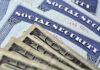 Welfare Tsunami Hits NYC Social Security cards with U.S. dollar bills